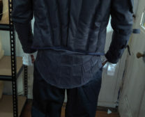 Back of men's leather coat for Three Musketeers themed wedding