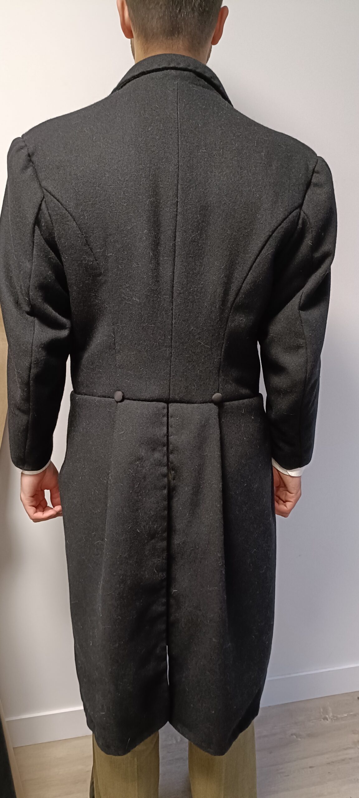 Black wool coat with tailored back created by Velvet Cherry, Wellington NZ