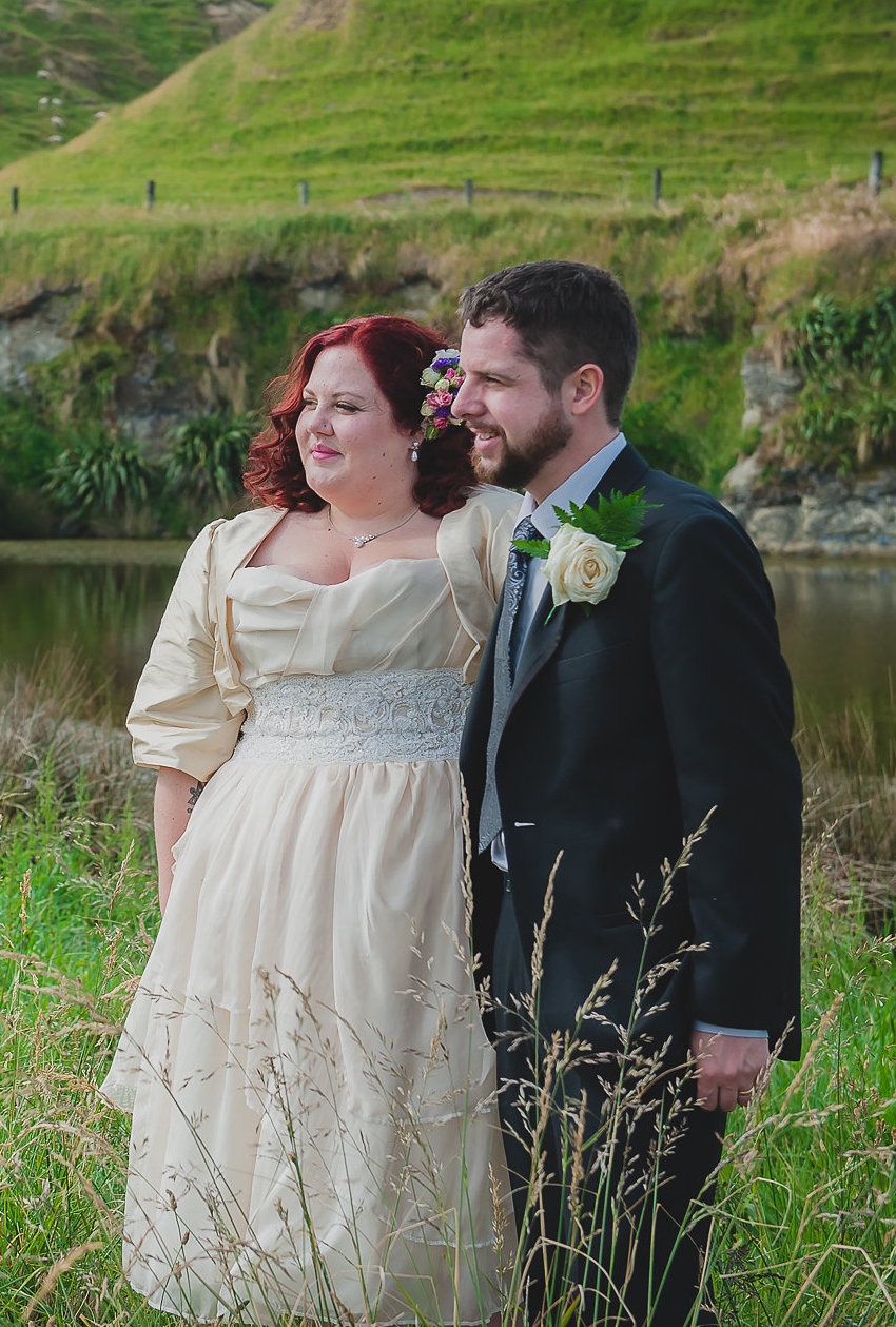 Beautiful curvy bride in a cream and lace wedding dress custom made by Velvet Cherry, Wellington, NZ