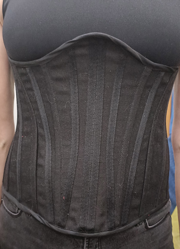 A classic black cotton corset by Velvet Cherry.